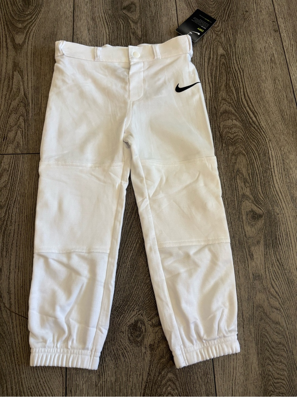 Nike Kids White Elastic Cuff Athletic Joggers with Black Swoosh